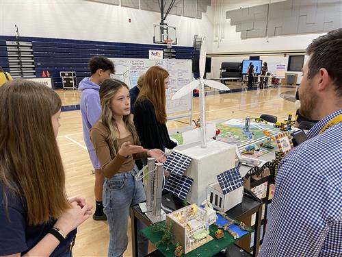 student share their work at STEM night